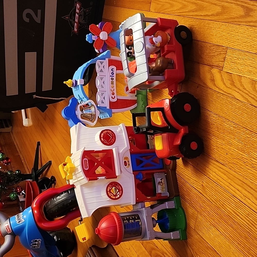 Fisher price barn, little people tractor, and cocmelon barn